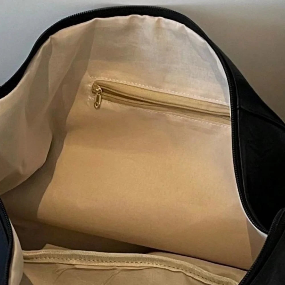 GETADME Stylish Dumpling Shaped PU Crossbody Bag for Men, Suitable for Casual Outings and Large Capacity Needs