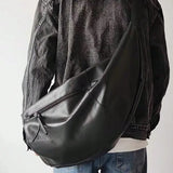 GETADME Stylish Dumpling Shaped PU Crossbody Bag for Men, Suitable for Casual Outings and Large Capacity Needs