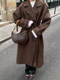 GETADME 2025 Chic Black Double-breasted Woolen Overcoat With Belt Women Fashion Lapel Collar Long Sleeve Coat Fall Lady New Streetwear ﻿