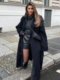 GETADME 2025 Chic Black Double-breasted Woolen Overcoat With Belt Women Fashion Lapel Collar Long Sleeve Coat Fall Lady New Streetwear ﻿