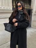 GETADME 2025 Chic Black Double-breasted Woolen Overcoat With Belt Women Fashion Lapel Collar Long Sleeve Coat Fall Lady New Streetwear ﻿