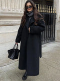 GETADME 2025 Chic Black Double-breasted Woolen Overcoat With Belt Women Fashion Lapel Collar Long Sleeve Coat Fall Lady New Streetwear ﻿