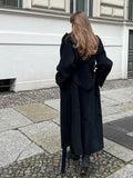 GETADME 2025 Chic Black Double-breasted Woolen Overcoat With Belt Women Fashion Lapel Collar Long Sleeve Coat Fall Lady New Streetwear ﻿