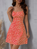 Getadme The cami dress with small flower prints a backless design and thin spaghetti straps is suitable for beach vacations and summer