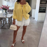 GETADME Autumn Warm Long Sleeved Sweater Lady Elegant Wool Long Sleeved Knitted Cardigan 2024 Casual Commuting Bow Tie-up Solid Sweater