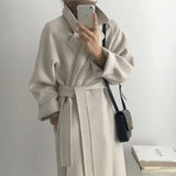 GETADME Chic Thick Warm Lapel Lace-up Pockets Loose Woolen Coat 2025 Autumn Winter New Korean Female Long Oversize Casual Women Clothes