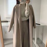 GETADME Chic Thick Warm Lapel Lace-up Pockets Loose Woolen Coat 2025 Autumn Winter New Korean Female Long Oversize Casual Women Clothes