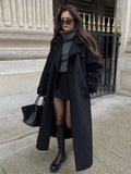 GETADME Elegant With Belt Black Long Coat For Women Oversize Woolen Double Button Lapel Overcoat Autumn New Lady High Street Outerwear