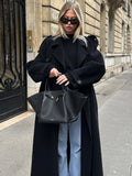 GETADME Elegant With Belt Black Long Coat For Women Oversize Woolen Double Button Lapel Overcoat Autumn New Lady High Street Outerwear
