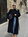 GETADME Elegant With Belt Black Long Coat For Women Oversize Woolen Double Button Lapel Overcoat Autumn New Lady High Street Outerwear
