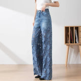Jean élégant et tendance GETADME pour femme, taille haute, empiècements en dentelle, pantalon oversize ajouré, coupe ample et décontractée, idéal pour le printemps.