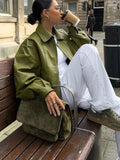 GETADME Fashion Lapel Collar Green Pu Leather Short Jackets For Women Locomotive Button Long Sleeve Coats Female 2025 Autumn Office Wear
