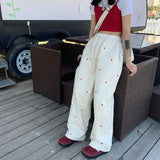 GETADME Korean Women's Sports Pants Cute Wide Leg Pants Fashion Love Embroidered Joker Pants Women's Harajuku Sports Pants Beige 2025