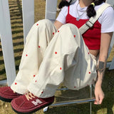 GETADME Korean Women's Sports Pants Cute Wide Leg Pants Fashion Love Embroidered Joker Pants Women's Harajuku Sports Pants Beige 2025