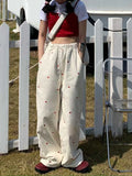 GETADME Korean Women's Sports Pants Cute Wide Leg Pants Fashion Love Embroidered Joker Pants Women's Harajuku Sports Pants Beige 2025