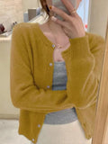 GETADME 2025 Hauts à manches longues style vintage Y2K, cardigan coréen en maille, pull polyvalent à col rond et coupe amincissante, idéal pour l'automne et l'hiver.