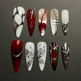 GETADME 24Pcs Black Y2k Long False Nails with Almond Head Design Cat's Eye Silver Stripe Pattern Press on Fake Nails Wearable Nail Tips