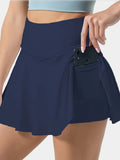 GETADME Women's Solid Color High Waisted Tennis Pleated Skirts Inner Pocket Quick Drying Sports Short Running Fitness Skirt