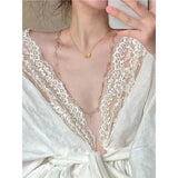 GETADME Elegant Lace Shirts Women Vintage Sexy V Neck Bandage Blouses Summer Fairy Korean Patchwork Long Sleeve Casual Design Tops New