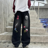 GETADME 2026 Boys' Street Style Straight Jeans: Black Denim with Cartoon Letter Back Print (Ages 4-14