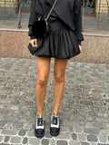 GETADME Women Summer Bubble Mini Skirt Vintage Grunge High Waist Puffy Short Skirt for Vacation Club Streetwear Aesthetic Clothes