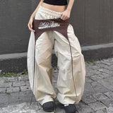 GETADME 스웨트 와이드 레그 팬츠 여성 봄 여름 블랙 디자인 센스 커브드 나이프 스트리트 힙합 댄스 팬츠 루즈하고 편안한 바지