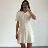 GETADME White Elegant Knitted Mini Dress For Women Metal Button Sexy Slim Rib Sweater Dress Holiday Party Outfits Autumn 2025 New
