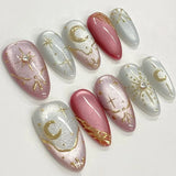 GETADME 24Pcs Black Y2k Long False Nails with Almond Head Design Cat's Eye Silver Stripe Pattern Press on Fake Nails Wearable Nail Tips