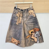 GETADME Womens Baggy Denim Shorts Vintage Washed Teddy Bear Print Wide Leg Mid Length Casual Streetwear Loose Jean Culottes for Women
