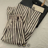 GETADME Retro Chic Solid Color Striped Skirt for Women in Summer, High Waisted and Slimming A-line Mid Length Umbrella Skirt