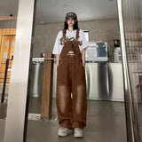 GETADME Retro American Brown Embroidered Bib Overalls Women Loose Straight Leg Jeans Slimming One-Piece Pants High Waist Denim