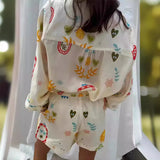 GETADME 여성 패션 신축성 허리 투피스 세트 우아한 꽃무늬 라펠 긴팔 상의 짧은 바지 정장 캐주얼 휴가 복장