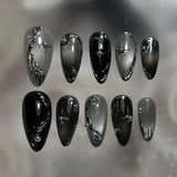GETADME 24Pcs Black Y2k Long False Nails with Almond Head Design Cat's Eye Silver Stripe Pattern Press on Fake Nails Wearable Nail Tips