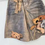 GETADME Womens Baggy Denim Shorts Vintage Washed Teddy Bear Print Wide Leg Mid Length Casual Streetwear Loose Jean Culottes for Women