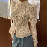 GETADME Elegant Embroidery Puff Sleeve White Shirts Summer Sexy Hollow Out Lace Blouse Casual Sand Collar Top 2025 Vintage Shirts