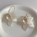 Boucles d'oreilles pendantes GETADME vintage en métal irrégulier, style USA, avec pendentifs originaux, accessoires de voyage et de mariage.