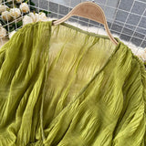 GETADME Women Sexy Chiffon Short Blouse Female See Through Super Long Sleeve Blusas Purple/Green/Black/White Folds Party Tops 2026 New