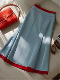 GETADME Bomon Y2K blue and red color contrast baseball slant skirt women 2025 new pre-fall fashion design high-waisted mid-long skirt
