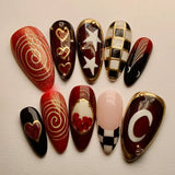 GETADME 24Pcs Black Y2k Long False Nails with Almond Head Design Cat's Eye Silver Stripe Pattern Press on Fake Nails Wearable Nail Tips