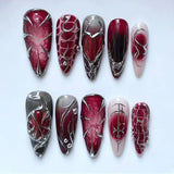 GETADME 24Pcs Black Y2k Long False Nails with Almond Head Design Cat's Eye Silver Stripe Pattern Press on Fake Nails Wearable Nail Tips