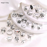 GETADME 24Pcs/Set Punk Gothic Rings Sets Silver Color Skeleton Spider Poker Joker Eyes Heart Rings For Men Fashion Hip Hop Jewelry Gifts