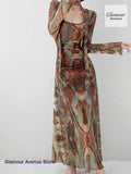 GETADME French-style fashion halo-dyed gauze printed ribbon dress women's spring and summer pleated waist slim lantern sleeve dress