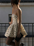 GETADME Nibber Dots Print Dress Women Chest Wrap Backless Bow Applique Ruffles Loose Hem 2025 Y2k Trend Streetwear Chic Mini Bodycon