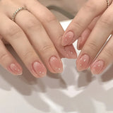 GETADME 24Pcs Short Oval Head Blush Pink Press on Nails with Simple Designs Almond Nails Wearable Acrylic Full Cover Nail Tips with Glue