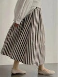 GETADME Retro Chic Solid Color Striped Skirt for Women in Summer, High Waisted and Slimming A-line Mid Length Umbrella Skirt