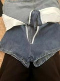 GETADME 2025 summer Korean style niche design slimming high waist cuffed denim short skirt for women anti-exposure A-line hip skirt