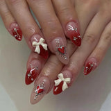 GETADME 24 PCs Valentine's Day Long Almond Shape Novelty Pearl Bow Love Nail with 1 File and 1 Jelly Glue