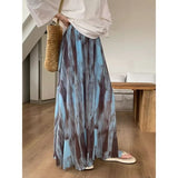 GETADME Retro Tie Dye Midi Skirt for Women in Early Spring Vacation Style, High Waisted A-line Skirt Hanging Long Skirt, Big Swing Skirt