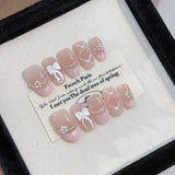 GETADME 10Pcs Cute Cat Eye Almond Fake Nail Blue Shiny with Small Rhinestone Nail Art Nude Color Short Oval Finished Artificial Manicure