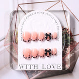 GETADME 핑크 레오파드 프린트 프렌치 팁 가짜 손톱 24개입 짧은 사각형 머리 3D 블랙 리본 모양 가짜 손톱 아크릴 풀 커버 프레스온 손톱